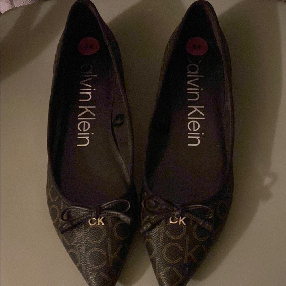 Calvin Klein Black Flats Timeless Elegance
